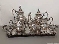 Front view showing full 6-piece silverplate tea and coffee set on tray