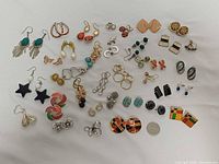 Overall view of all pairs laid out, coin for scale