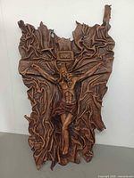 Front view of entire leather crucifix plaque