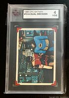 Front of KSA-slabbed 1966 OPC Batman card #13 showing image and grade label