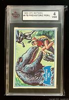 Front view of the encapsulated 1966 OPC Batman #17B Prehistoric Peril card showing artwork and KSA 4 label
