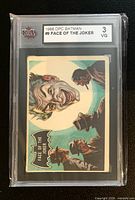 Front of slabbed 1966 OPC Batman card #9 showing Joker image and KSA grade label