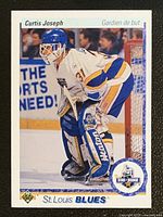 Front of Curtis Joseph Upper Deck French rookie card showing photo and Star Rookie logo