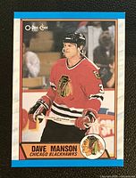 Card front showing Dave Manson in Chicago Blackhawks uniform, card number and branding visible.