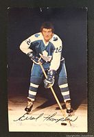 Front of postcard showing Errol Thompson image and autograph
