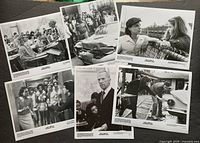 Six black-and-white movie stills laid out showing various scenes and characters