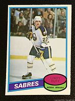 Front of Lindy Ruff O-Pee-Chee card showing player image and team name