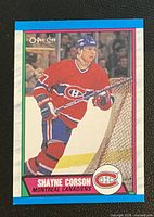 Front of Shayne Corson O-Pee-Chee rookie card showing player in Canadiens uniform