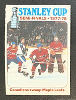 Front of OPC hockey card showing action photo and headline