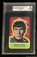 Front of KSA-slabbed Topps Star Trek #19 Spock Lives! sticker showing grade 8 NMM label