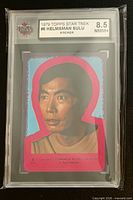 Front of encapsulated 1979 Topps Star Trek #6 Helmsman Sulu sticker showing portrait, pink border and KSA grade 8.5 label.
