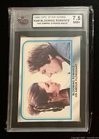 Front of card in KSA slab showing grade 7.5 and image of Han and Leia