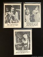 Front view of three sleeved 1964 Leaf The Munsters cards showing captions and characters