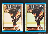 Front view of both rookie cards side by side: O-Pee-Chee (left) and Topps (right) displaying player image and team logo.