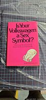 Front cover showing title, author and car illustration