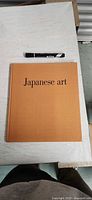 Front cover showing title "Japanese art" on orange cloth