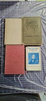 Front covers of all four books shown
