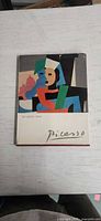 Front cover showing Picasso artwork and title band