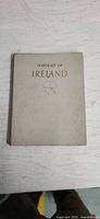 Front cover showing title and clover motif