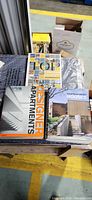 All three hardcover books arranged on table