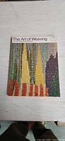 Front cover of The Art of Weaving paperback