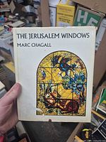 Front cover of The Jerusalem Windows showing title, author, dust jacket art