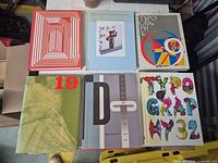 All six hardcover Typography annuals laid out front covers visible