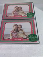 Front view of two boxed sets showing card design and Hallmark labeling