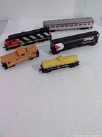 Group shot showing all five model train pieces