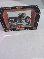 Front view of boxed Maisto 1991 FXDB Sturgis motorcycle model