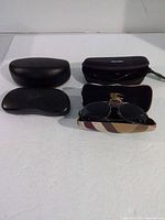 Group shot of all cases and Burberry sunglasses