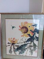 full view of framed Hui Chi Mau print