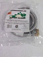 Front of sealed package showing Gator Chomp label and length