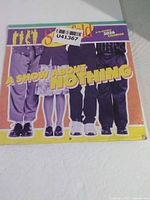 Front of sealed Seinfeld 2026 calendar showing cover art