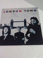 Front album cover showing title and band members