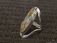 Side view showing multicolour mosaic stone and sterling mount