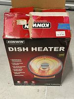 Retail box showing Konwin dish heater specifications 1000W