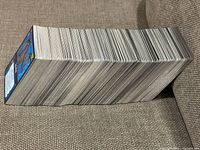 Thick stack of .hack//ENEMY trading cards side view