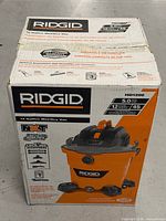 Front of sealed Ridgid HD1200 vacuum box showing model, capacity, power