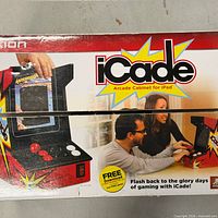 Retail box front showing ION iCade Arcade Cabinet for iPad artwork and branding