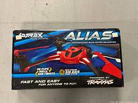 Retail box showing Latrax Alias branding and drone image