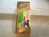 Front of sealed Allura Hardwood Floor Care System box