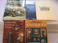 All five books front covers visible