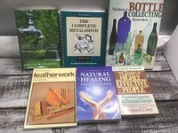 All six books front covers visible