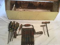 Overall view: toolbox, screwdrivers, brace drill with bits, T-handle bits