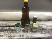 All five assorted collector containers displayed together
