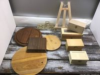 All ten wooden crafting pieces laid out