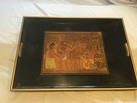 Top view of rectangular lacquered tray with Egyptian artwork