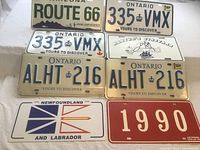 All eight license plates laid out for overview