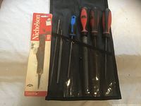 Overall view of Mac Tools case open with files and Nicholson packaged file